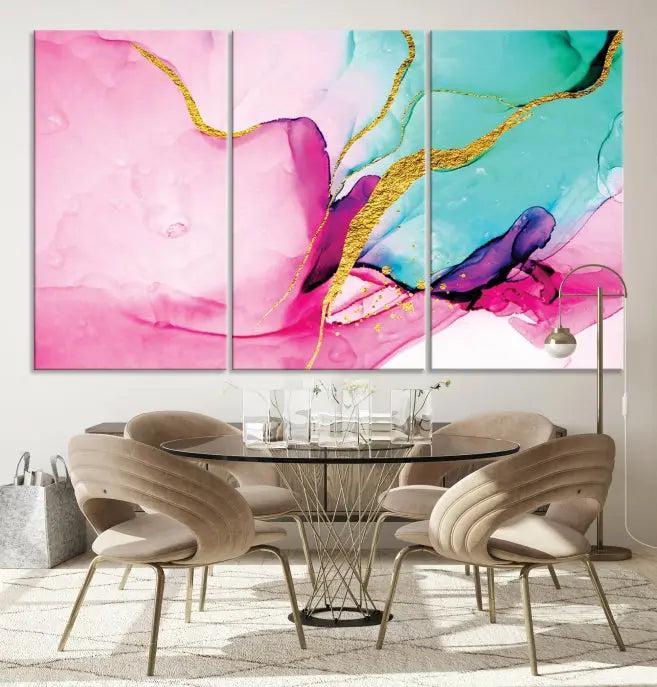 The Pink and Gold Marble Fluid Effect Wall Art Abstract Canvas Wall Art Print embellishes the space with its stunning design. Created on museum-quality canvas, this gallery-wrapped piece includes a UV-protective coating to maintain its vivid colors.