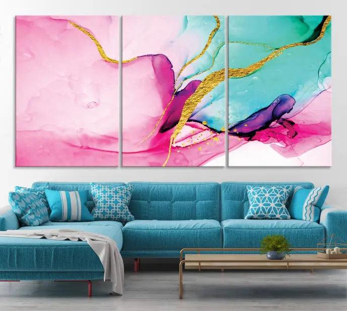 The Pink and Gold Marble Fluid Effect Wall Art Abstract Canvas Wall Art Print embellishes the space with its stunning design. Created on museum-quality canvas, this gallery-wrapped piece includes a UV-protective coating to maintain its vivid colors.