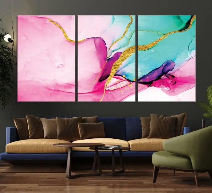 The Pink and Gold Marble Fluid Effect Wall Art Abstract Canvas Wall Art Print embellishes the space with its stunning design. Created on museum-quality canvas, this gallery-wrapped piece includes a UV-protective coating to maintain its vivid colors.