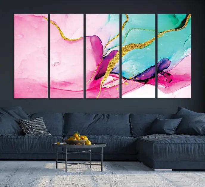 The Pink and Gold Marble Fluid Effect Wall Art Abstract Canvas Wall Art Print embellishes the space with its stunning design. Created on museum-quality canvas, this gallery-wrapped piece includes a UV-protective coating to maintain its vivid colors.