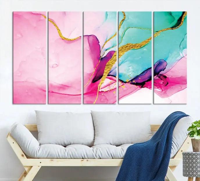 The Pink and Gold Marble Fluid Effect Wall Art Abstract Canvas Wall Art Print embellishes the space with its stunning design. Created on museum-quality canvas, this gallery-wrapped piece includes a UV-protective coating to maintain its vivid colors.