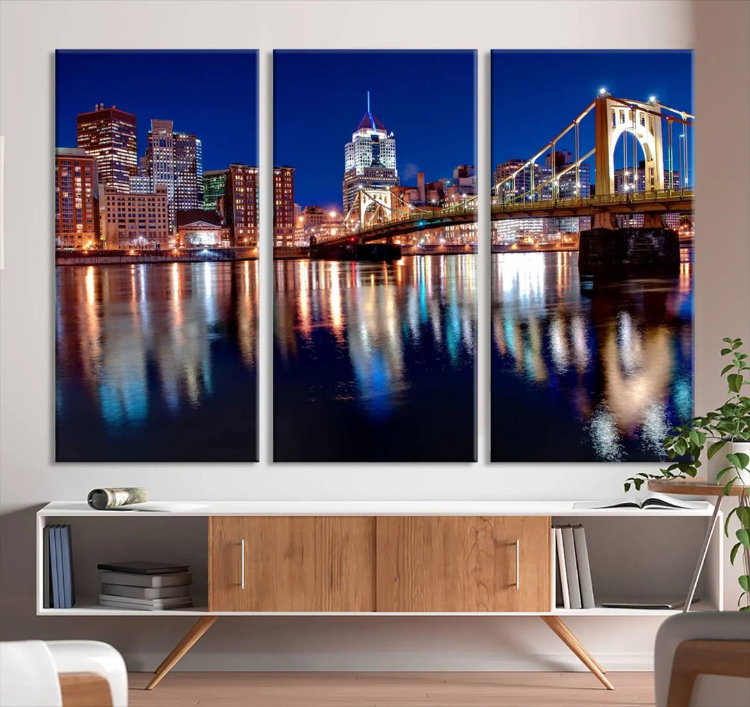 This living room showcases the striking "Pittsburgh City Canvas Wall Art Pittsburgh Skyline Canvas Print" on museum-quality canvases.