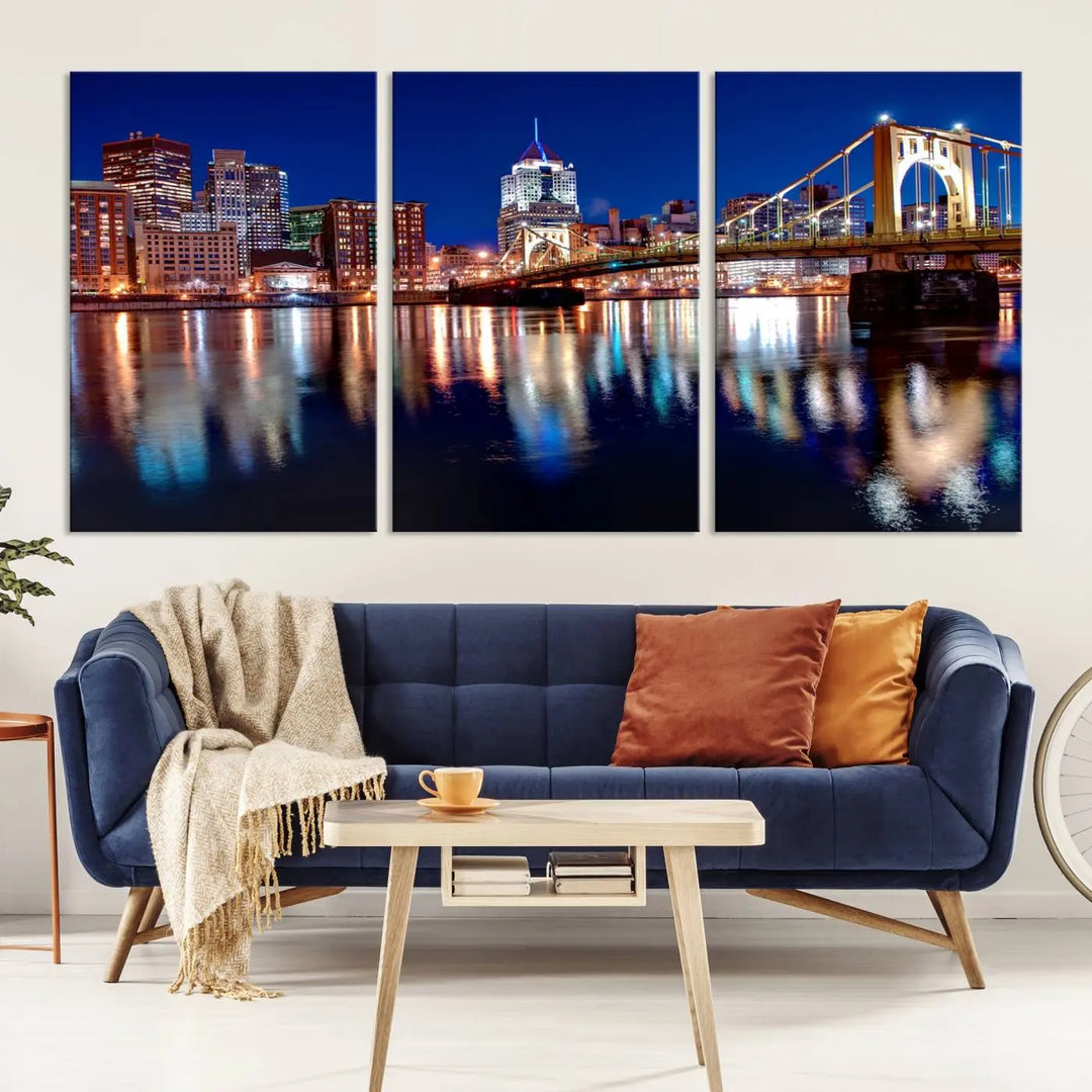 This living room showcases the striking "Pittsburgh City Canvas Wall Art Pittsburgh Skyline Canvas Print" on museum-quality canvases.