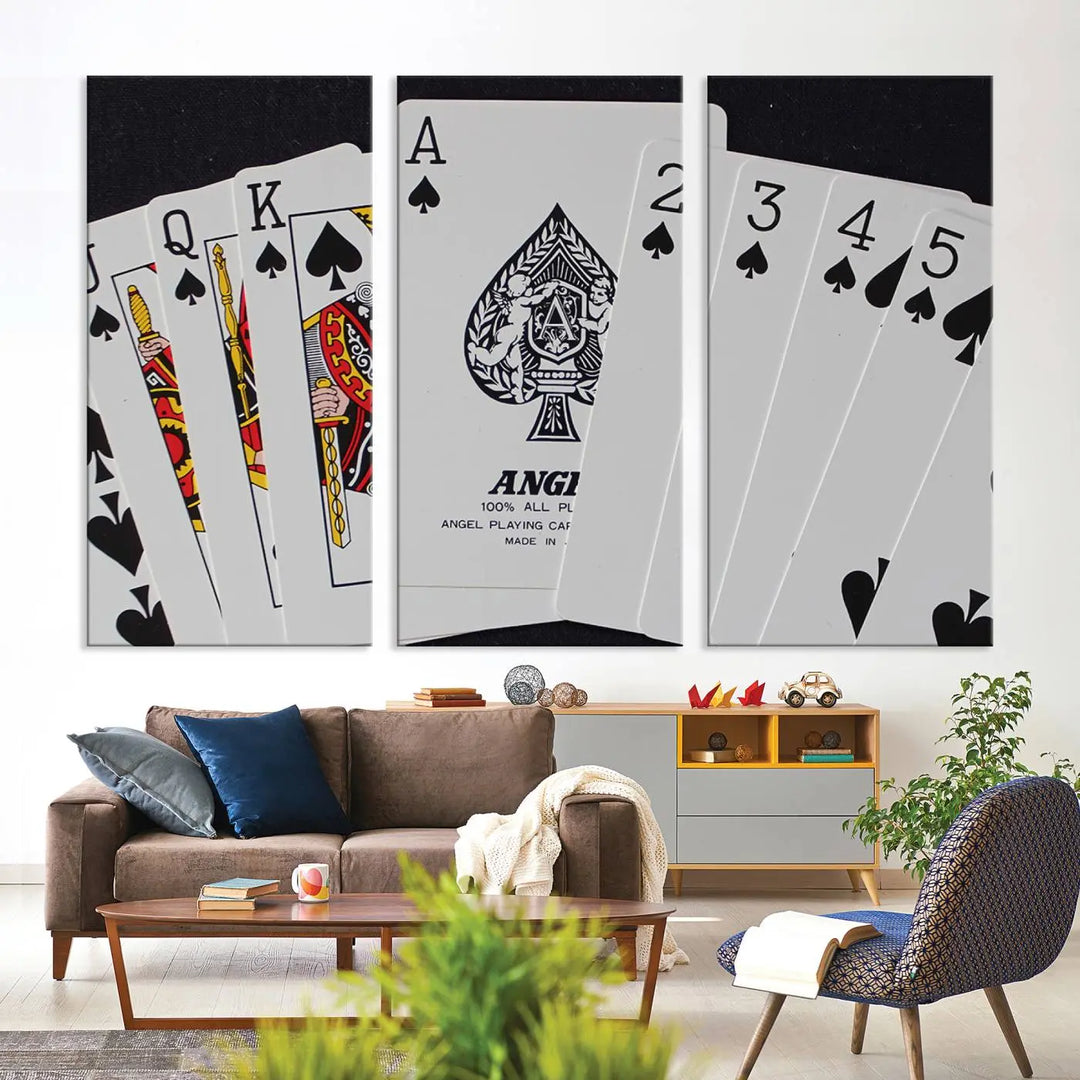 The Poker Wall Art - Playing Cards Canvas Wall Art Print features an Ace of Spades and Royal Flush design. This piece adds a classic charm to any space with its subtle emphasis on the Ace of Spades, making it perfect for game room decor.