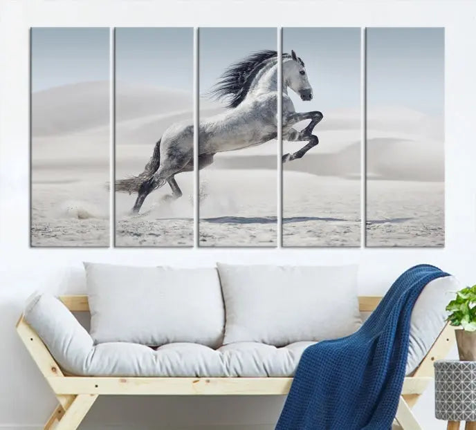 The Prancing Horse on Dessert canvas print, featuring a galloping horse in the desert and printed on museum-quality UV-coated canvas, is mounted prominently.