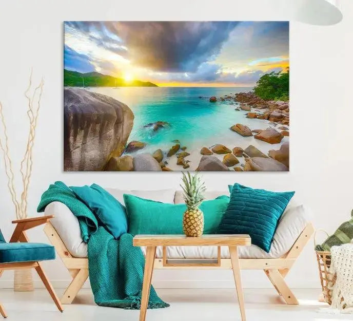 A triptych canvas of the Praslin Island Seychelles hangs on the wall. This vibrant beach sunset artwork features a UV-protective coating for lasting colors and comes with free shipping.