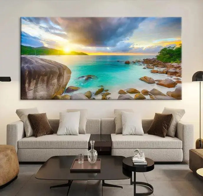 A triptych canvas of the Praslin Island Seychelles hangs on the wall. This vibrant beach sunset artwork features a UV-protective coating for lasting colors and comes with free shipping.