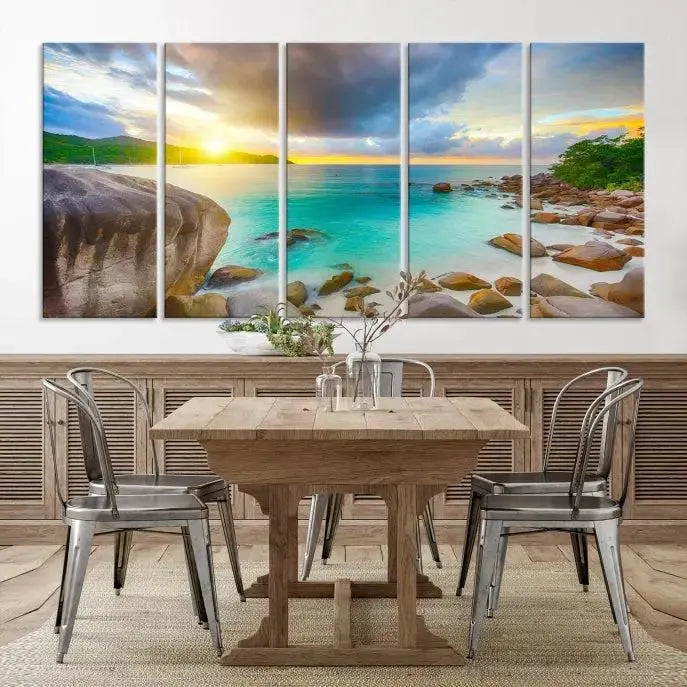 A triptych canvas of the Praslin Island Seychelles hangs on the wall. This vibrant beach sunset artwork features a UV-protective coating for lasting colors and comes with free shipping.