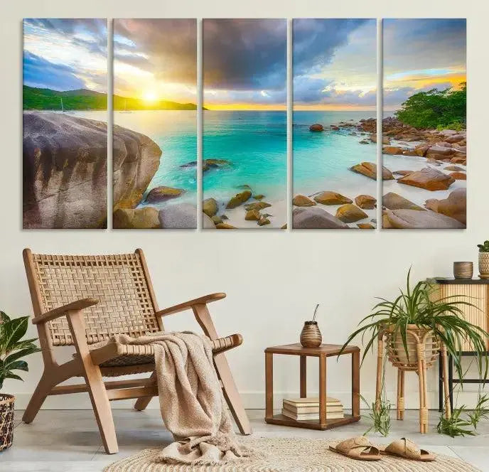 A triptych canvas of the Praslin Island Seychelles hangs on the wall. This vibrant beach sunset artwork features a UV-protective coating for lasting colors and comes with free shipping.