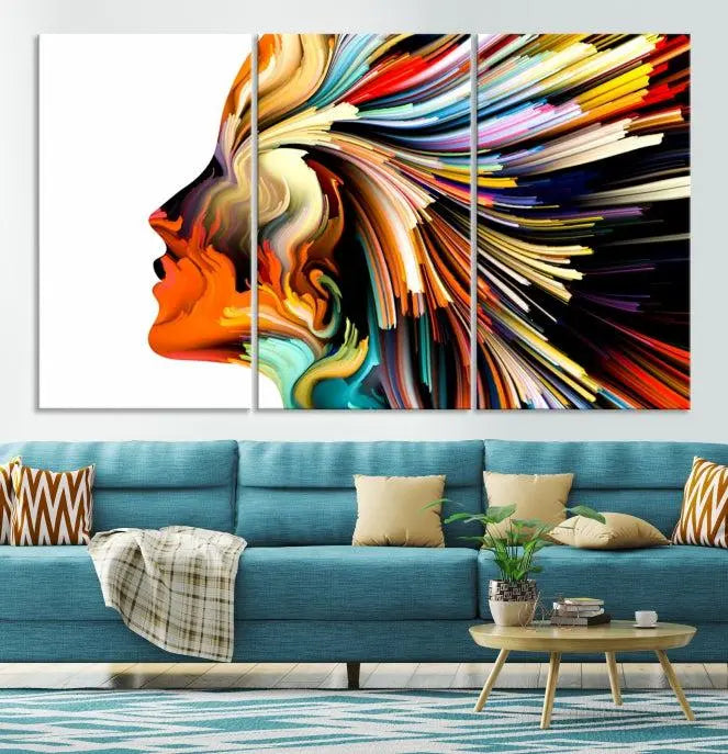 The "Profile Colors Canvas Print," featuring a colorful abstract face on museum-quality canvas, graces the wall.