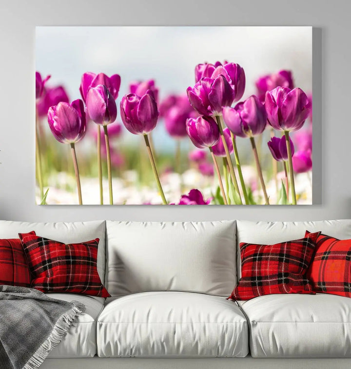 A triptych of purple tulips adds elegance to a modern living room. The Purple Tulips Canvas Wall Art Print, crafted on museum-quality canvases, captures the essence of professional artistry.