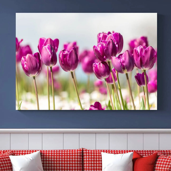 A triptych of purple tulips adds elegance to a modern living room. The Purple Tulips Canvas Wall Art Print, crafted on museum-quality canvases, captures the essence of professional artistry.