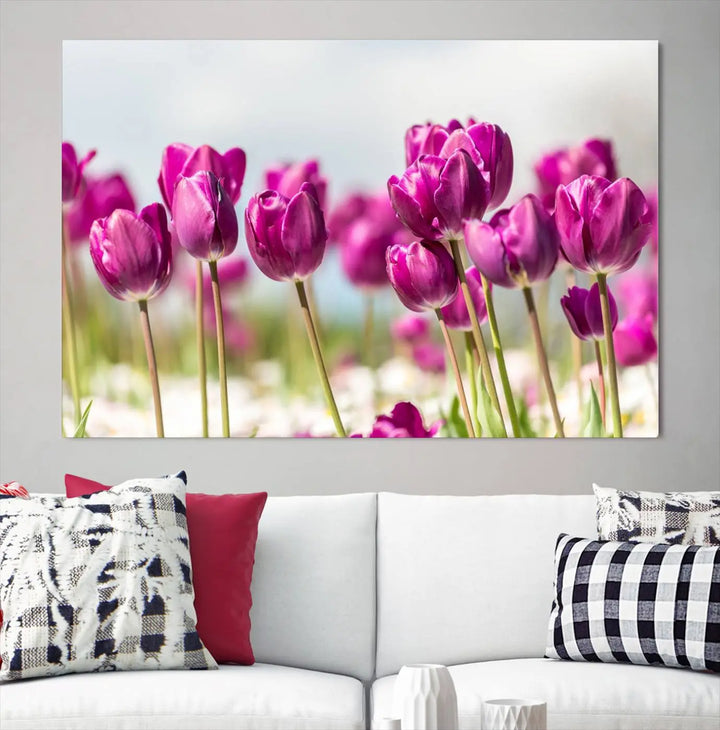 A triptych of purple tulips adds elegance to a modern living room. The Purple Tulips Canvas Wall Art Print, crafted on museum-quality canvases, captures the essence of professional artistry.