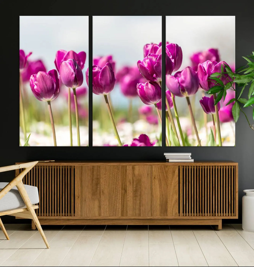 A triptych of purple tulips adds elegance to a modern living room. The Purple Tulips Canvas Wall Art Print, crafted on museum-quality canvases, captures the essence of professional artistry.