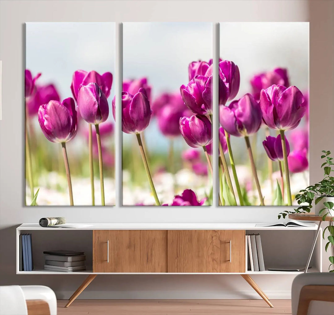 A triptych of purple tulips adds elegance to a modern living room. The Purple Tulips Canvas Wall Art Print, crafted on museum-quality canvases, captures the essence of professional artistry.