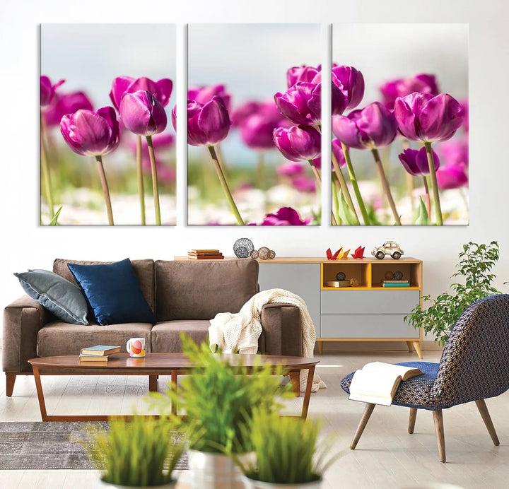 A triptych of purple tulips adds elegance to a modern living room. The Purple Tulips Canvas Wall Art Print, crafted on museum-quality canvases, captures the essence of professional artistry.