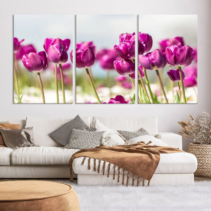 A triptych of purple tulips adds elegance to a modern living room. The Purple Tulips Canvas Wall Art Print, crafted on museum-quality canvases, captures the essence of professional artistry.