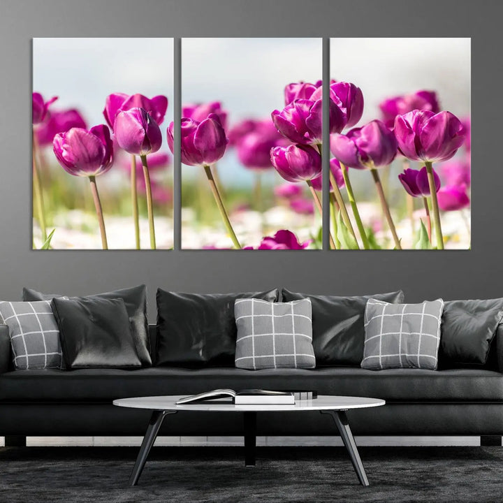 A triptych of purple tulips adds elegance to a modern living room. The Purple Tulips Canvas Wall Art Print, crafted on museum-quality canvases, captures the essence of professional artistry.