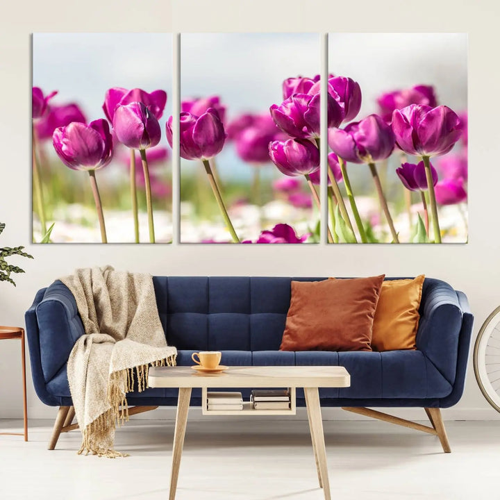 A triptych of purple tulips adds elegance to a modern living room. The Purple Tulips Canvas Wall Art Print, crafted on museum-quality canvases, captures the essence of professional artistry.