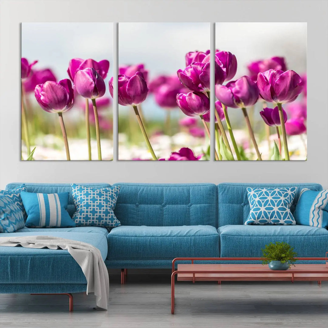 A triptych of purple tulips adds elegance to a modern living room. The Purple Tulips Canvas Wall Art Print, crafted on museum-quality canvases, captures the essence of professional artistry.