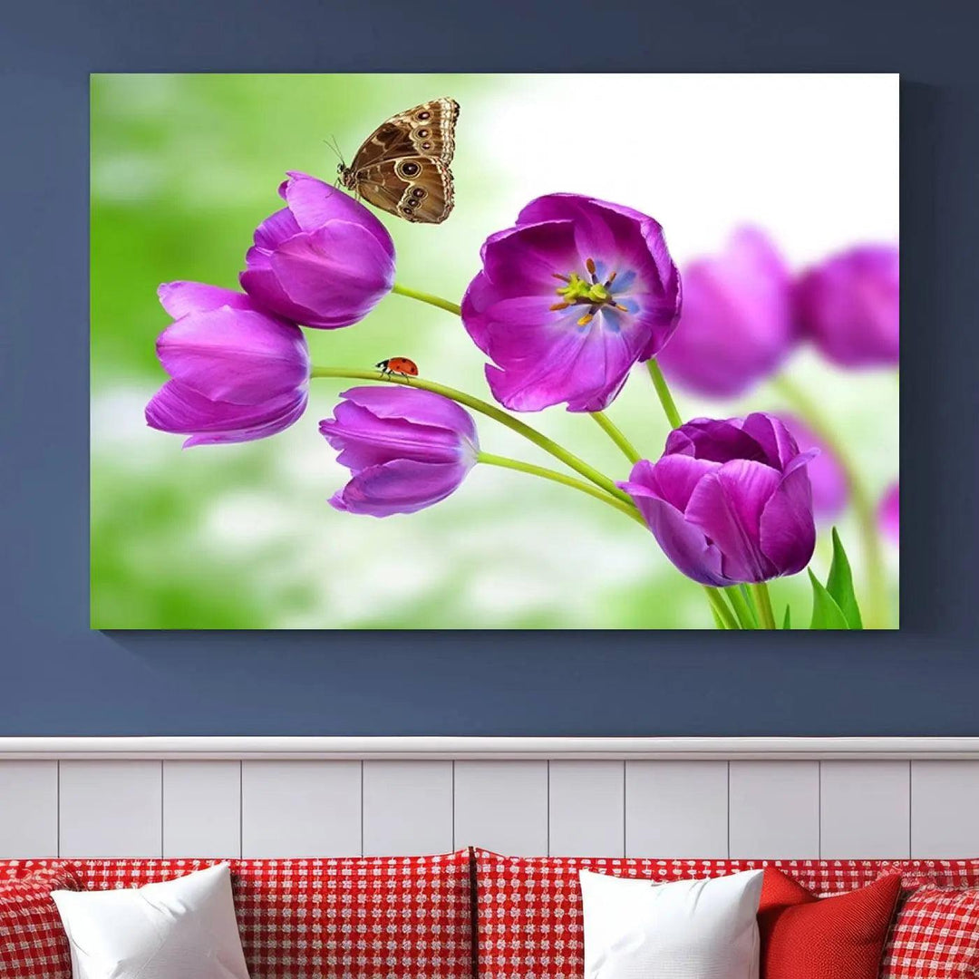 The Purple Tulips, Butterfly and Ladybug Wall Art Floral Canvas Print is a museum-quality piece elegantly displayed. Ready to hang, this artwork beautifully showcases a butterfly and ladybug amidst purple tulips.