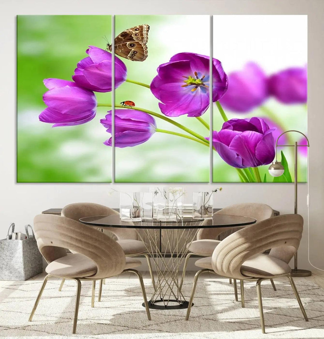 The Purple Tulips, Butterfly and Ladybug Wall Art Floral Canvas Print is a museum-quality piece elegantly displayed. Ready to hang, this artwork beautifully showcases a butterfly and ladybug amidst purple tulips.