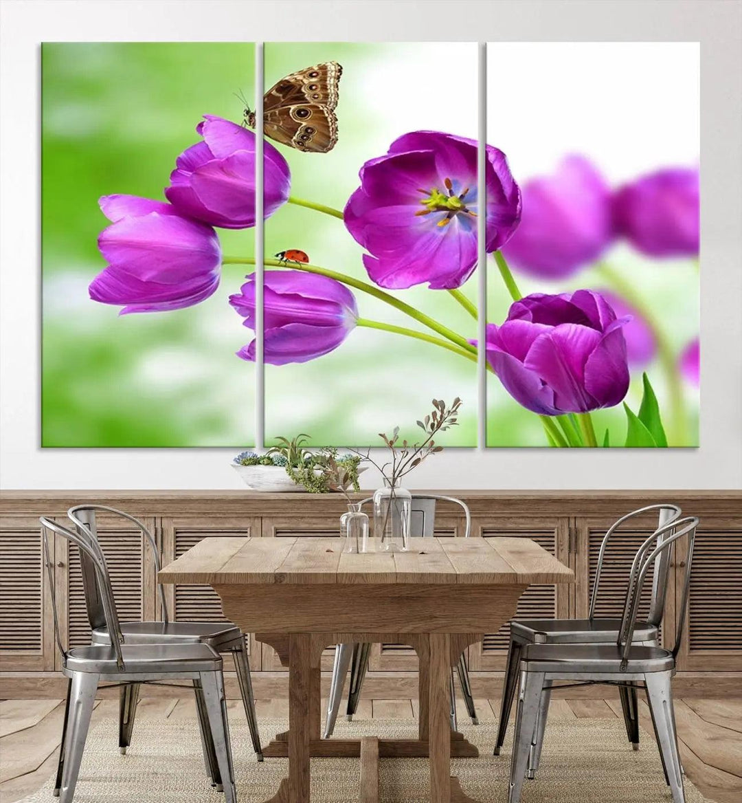 The Purple Tulips, Butterfly and Ladybug Wall Art Floral Canvas Print is a museum-quality piece elegantly displayed. Ready to hang, this artwork beautifully showcases a butterfly and ladybug amidst purple tulips.