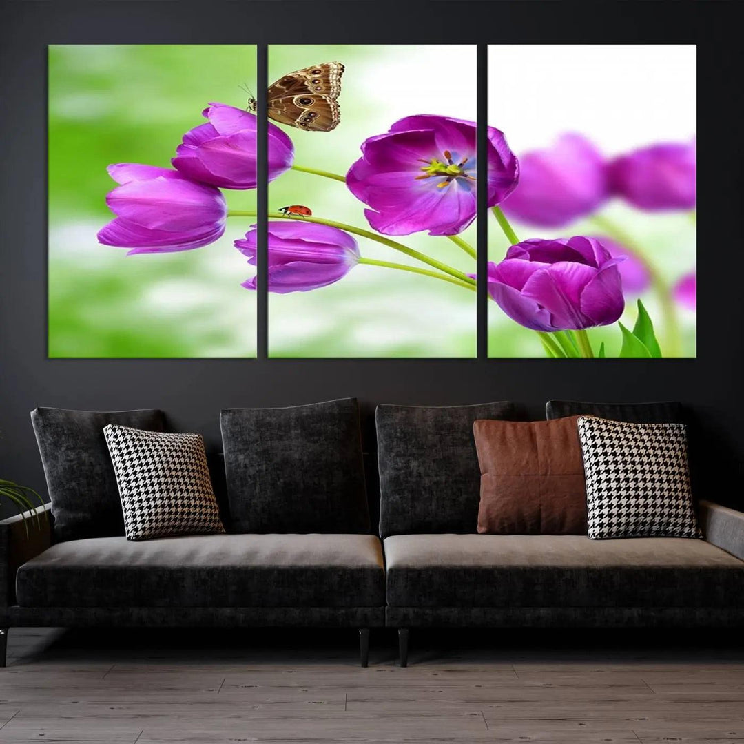 The Purple Tulips, Butterfly and Ladybug Wall Art Floral Canvas Print is a museum-quality piece elegantly displayed. Ready to hang, this artwork beautifully showcases a butterfly and ladybug amidst purple tulips.