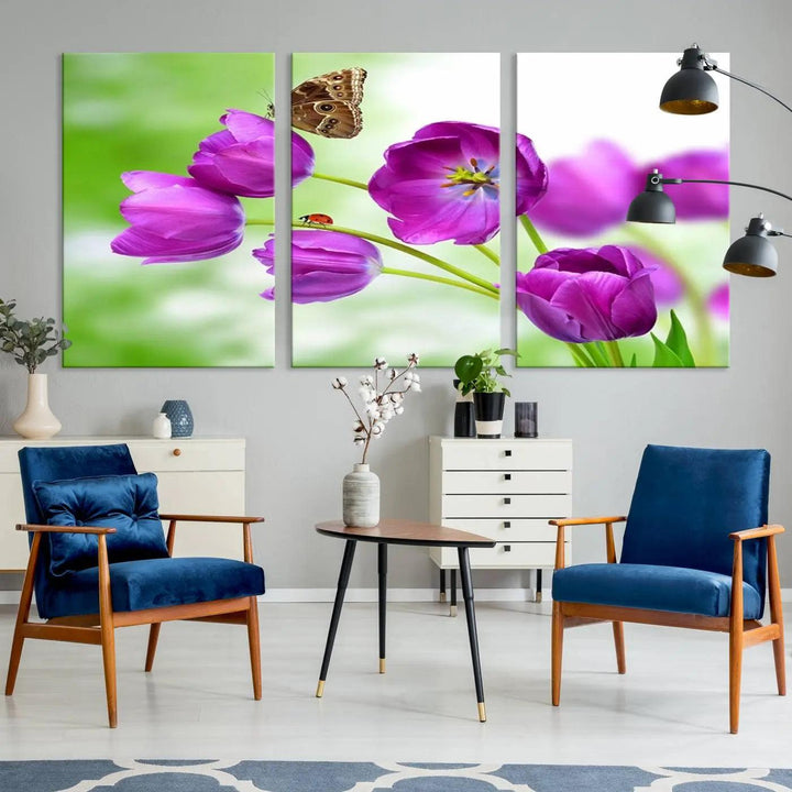 The Purple Tulips, Butterfly and Ladybug Wall Art Floral Canvas Print is a museum-quality piece elegantly displayed. Ready to hang, this artwork beautifully showcases a butterfly and ladybug amidst purple tulips.