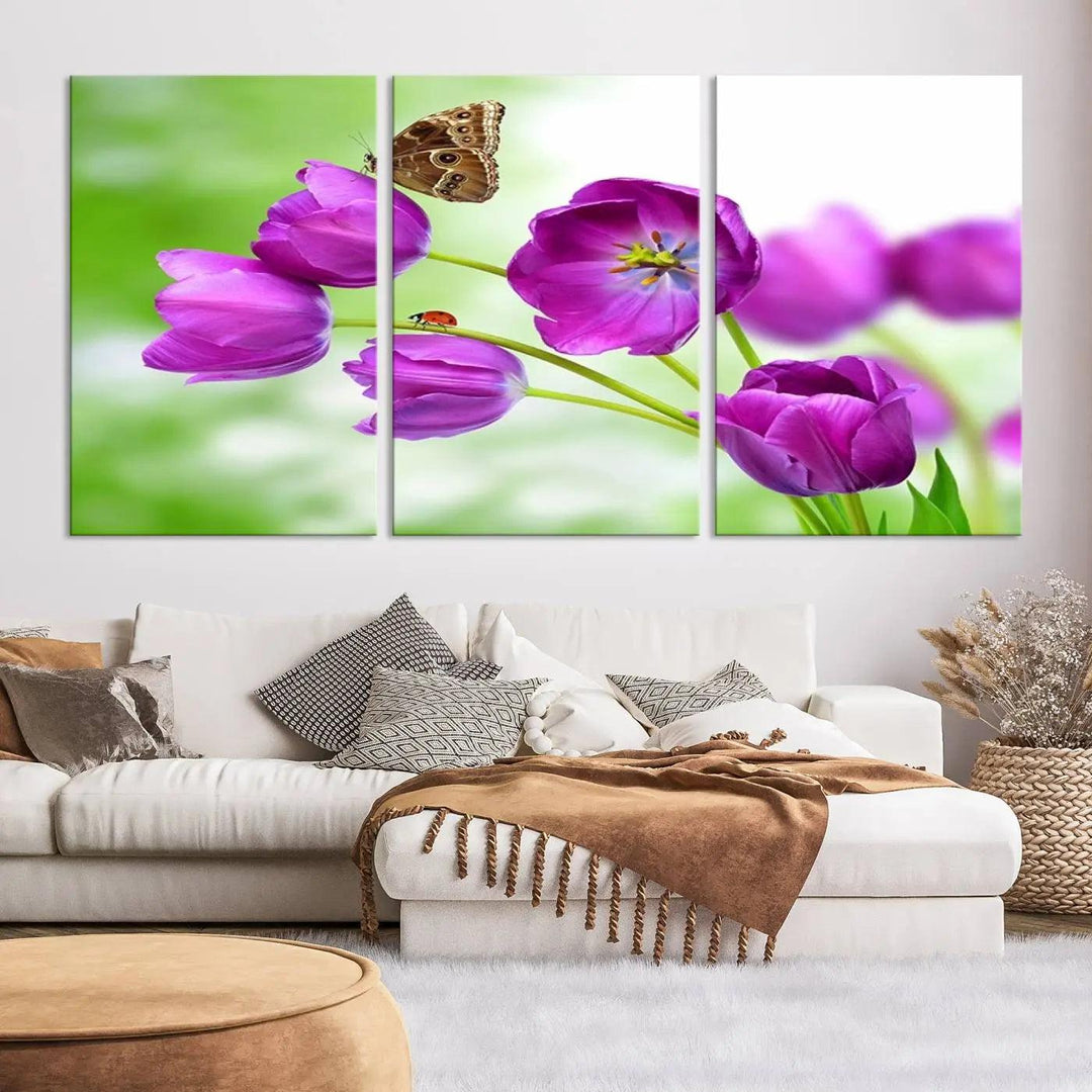 The Purple Tulips, Butterfly and Ladybug Wall Art Floral Canvas Print is a museum-quality piece elegantly displayed. Ready to hang, this artwork beautifully showcases a butterfly and ladybug amidst purple tulips.