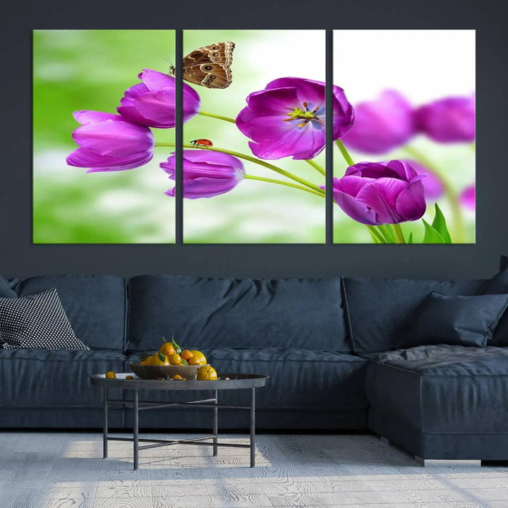 The Purple Tulips, Butterfly and Ladybug Wall Art Floral Canvas Print is a museum-quality piece elegantly displayed. Ready to hang, this artwork beautifully showcases a butterfly and ladybug amidst purple tulips.