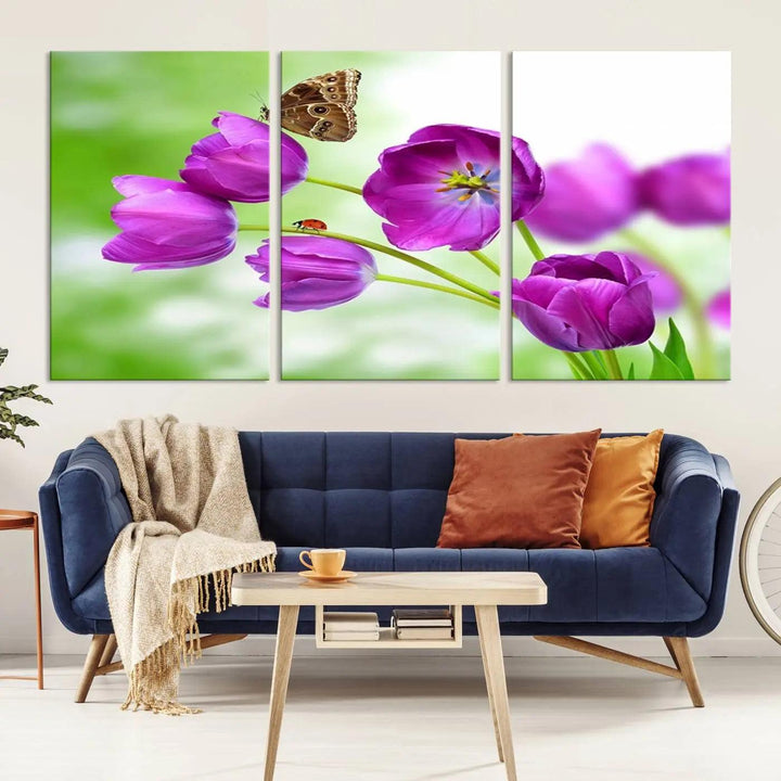 The Purple Tulips, Butterfly and Ladybug Wall Art Floral Canvas Print is a museum-quality piece elegantly displayed. Ready to hang, this artwork beautifully showcases a butterfly and ladybug amidst purple tulips.