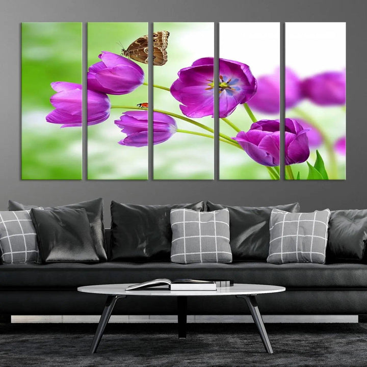 The Purple Tulips, Butterfly and Ladybug Wall Art Floral Canvas Print is a museum-quality piece elegantly displayed. Ready to hang, this artwork beautifully showcases a butterfly and ladybug amidst purple tulips.