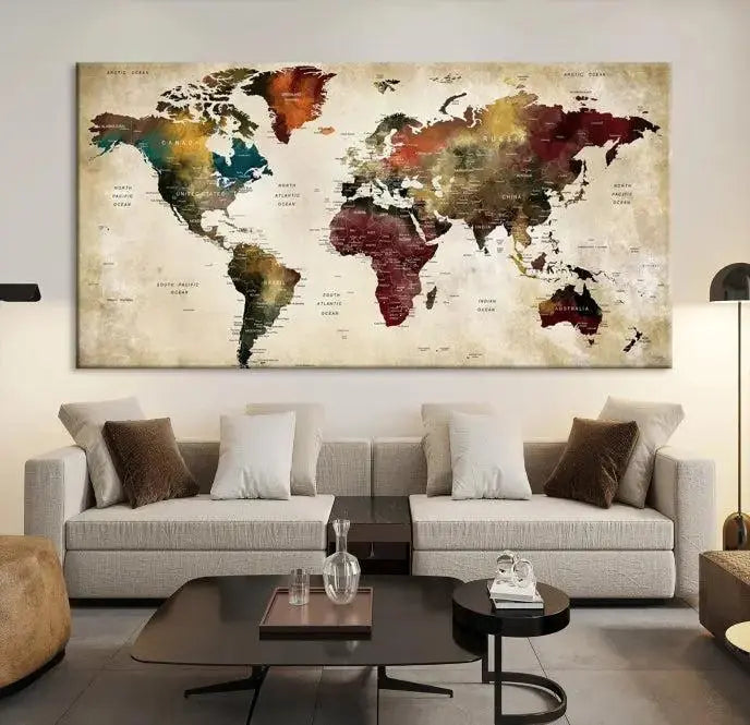 A Push Pin Watercolor World Map on a grunge background, printed on museum-quality canvases and gallery wrapped for a polished finish, hangs prominently on the wall.