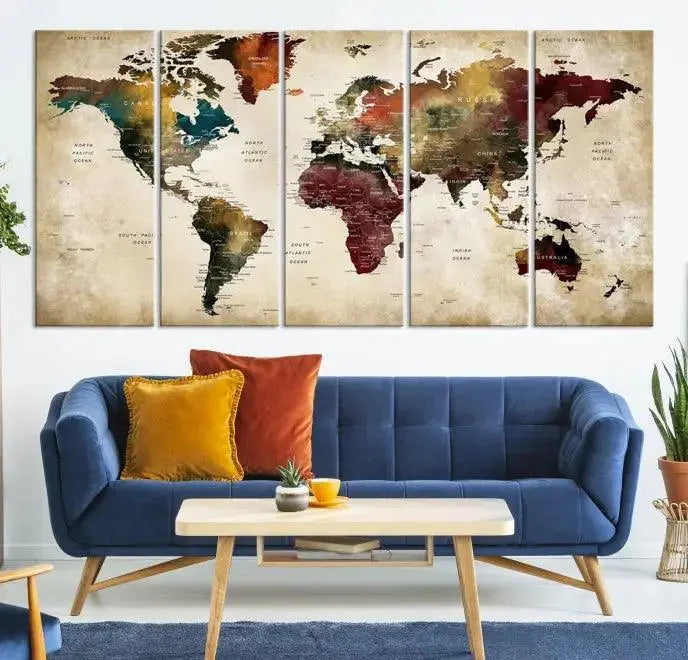 A Push Pin Watercolor World Map on a grunge background, printed on museum-quality canvases and gallery wrapped for a polished finish, hangs prominently on the wall.