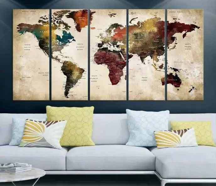 A Push Pin Watercolor World Map on a grunge background, printed on museum-quality canvases and gallery wrapped for a polished finish, hangs prominently on the wall.