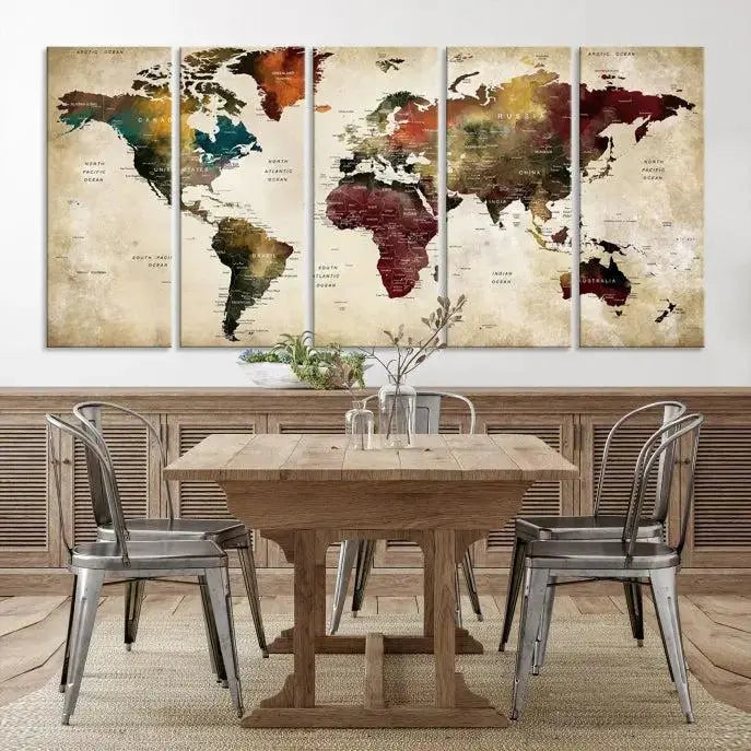 A Push Pin Watercolor World Map on a grunge background, printed on museum-quality canvases and gallery wrapped for a polished finish, hangs prominently on the wall.