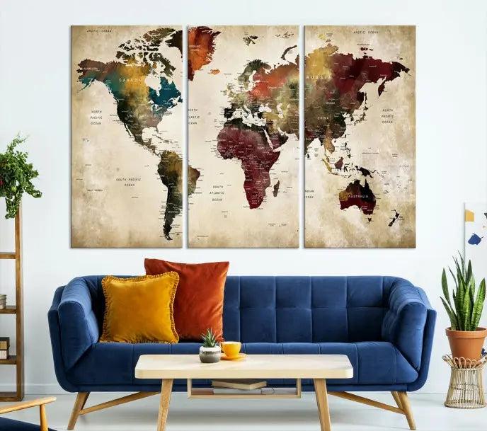 A Push Pin Watercolor World Map on a grunge background, printed on museum-quality canvases and gallery wrapped for a polished finish, hangs prominently on the wall.