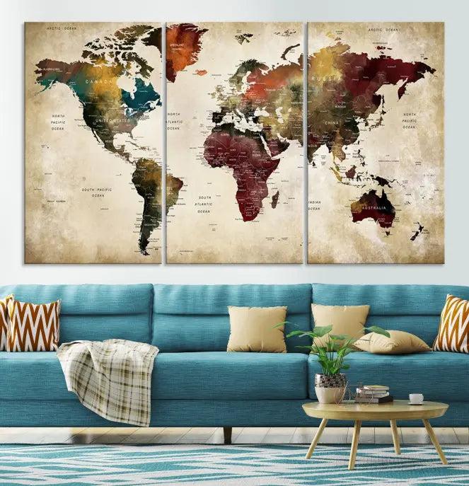 A Push Pin Watercolor World Map on a grunge background, printed on museum-quality canvases and gallery wrapped for a polished finish, hangs prominently on the wall.