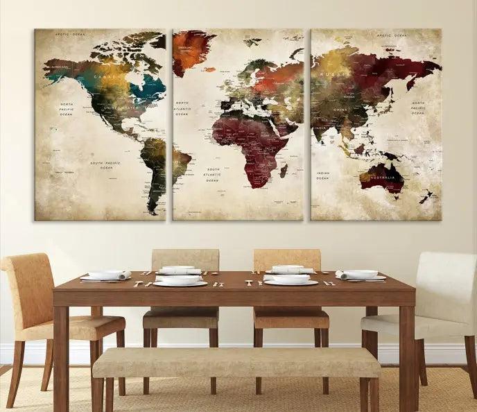 A Push Pin Watercolor World Map on a grunge background, printed on museum-quality canvases and gallery wrapped for a polished finish, hangs prominently on the wall.