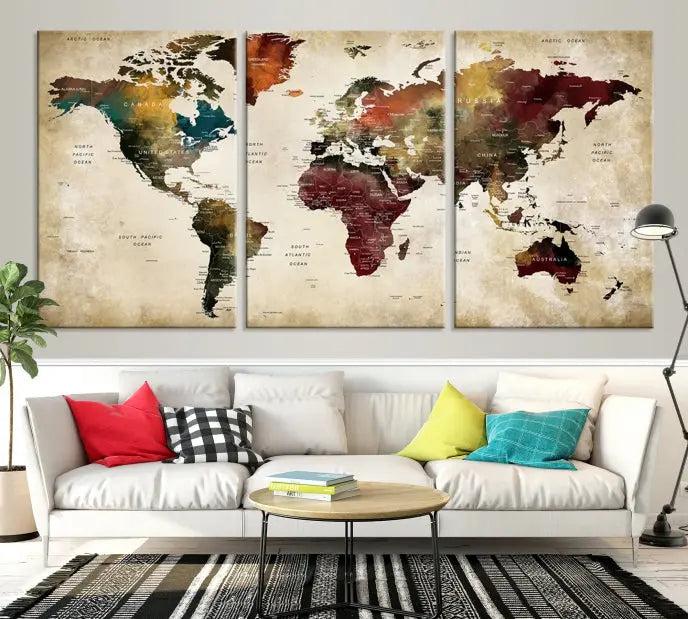 A Push Pin Watercolor World Map on a grunge background, printed on museum-quality canvases and gallery wrapped for a polished finish, hangs prominently on the wall.