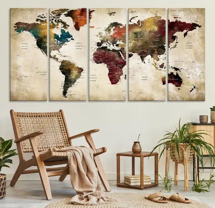 A Push Pin Watercolor World Map on a grunge background, printed on museum-quality canvases and gallery wrapped for a polished finish, hangs prominently on the wall.