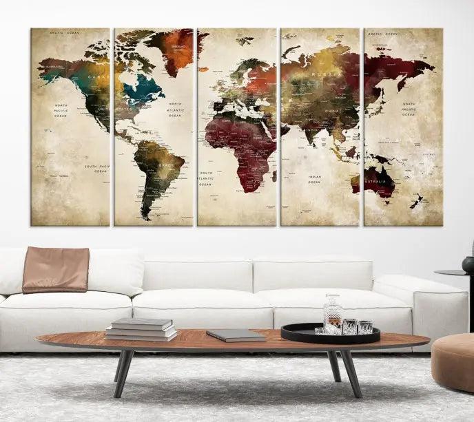 A Push Pin Watercolor World Map on a grunge background, printed on museum-quality canvases and gallery wrapped for a polished finish, hangs prominently on the wall.