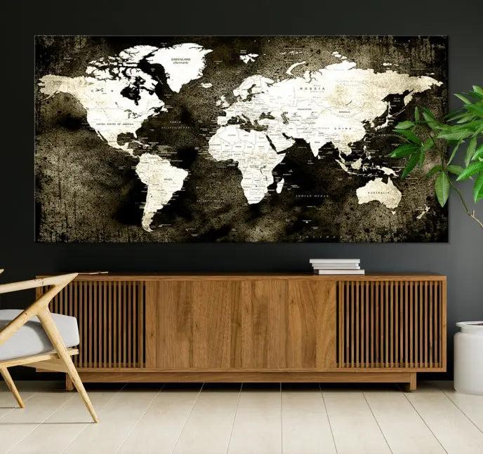 A gallery-wrapped, three-panel Push Pin World Map Canvas Print, crafted on museum-quality canvas, adorns the wall.