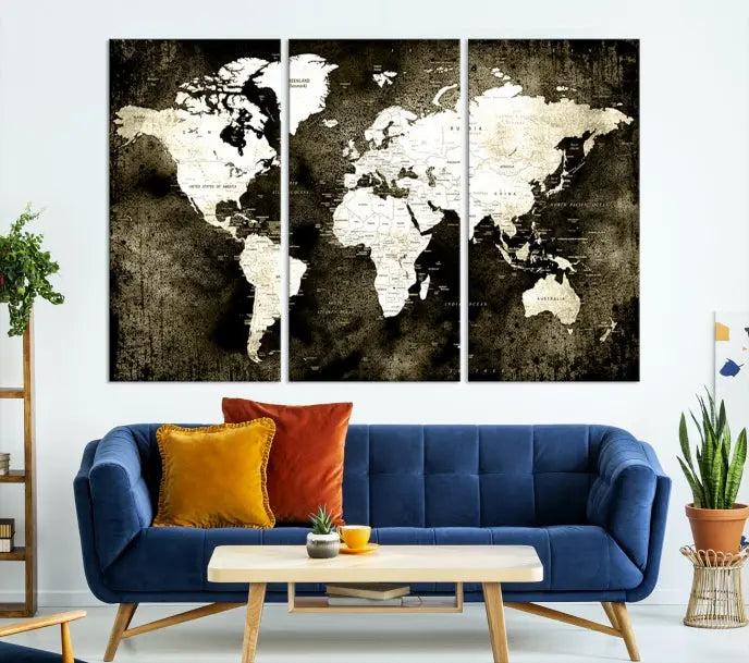 A gallery-wrapped, three-panel Push Pin World Map Canvas Print, crafted on museum-quality canvas, adorns the wall.