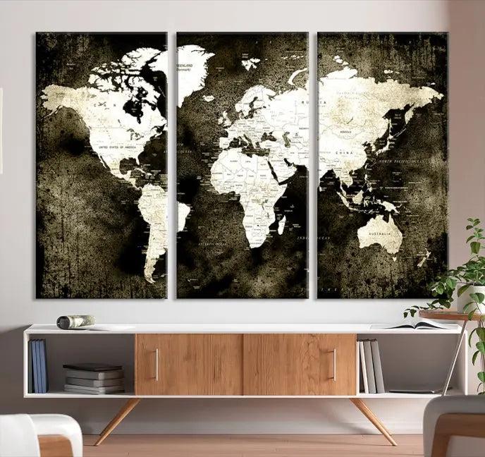 A gallery-wrapped, three-panel Push Pin World Map Canvas Print, crafted on museum-quality canvas, adorns the wall.