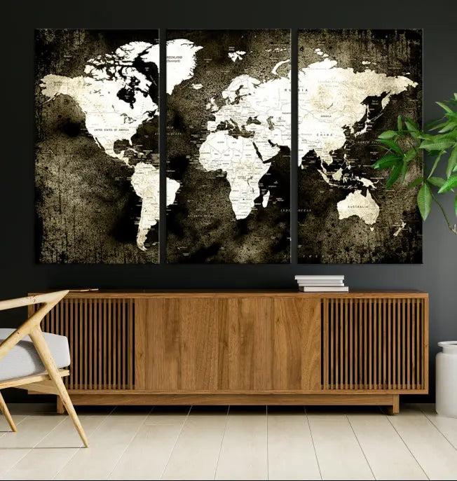 A gallery-wrapped, three-panel Push Pin World Map Canvas Print, crafted on museum-quality canvas, adorns the wall.