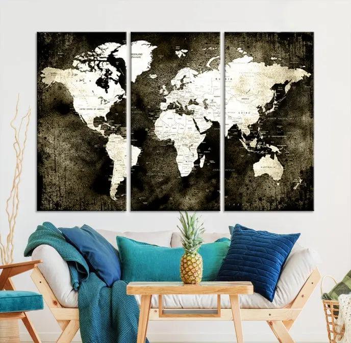 A gallery-wrapped, three-panel Push Pin World Map Canvas Print, crafted on museum-quality canvas, adorns the wall.