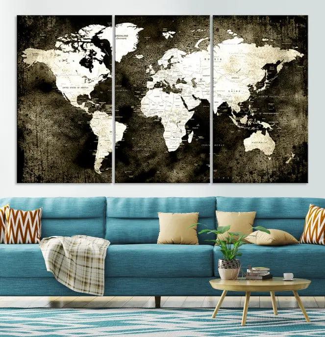 A gallery-wrapped, three-panel Push Pin World Map Canvas Print, crafted on museum-quality canvas, adorns the wall.