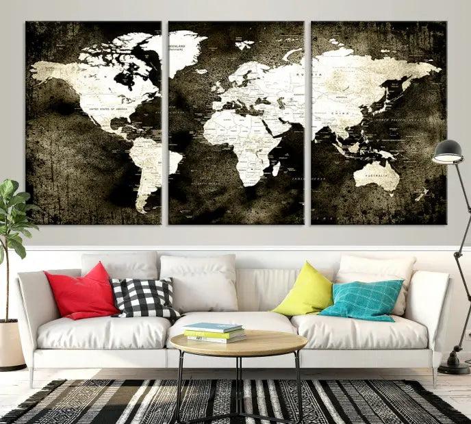 A gallery-wrapped, three-panel Push Pin World Map Canvas Print, crafted on museum-quality canvas, adorns the wall.